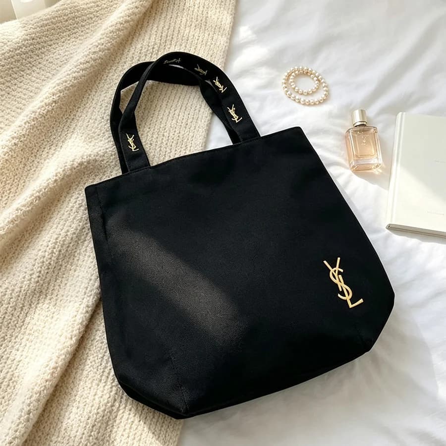 Sac à bandoulière en toile noire de luxe minimaliste YSL de Yves Saint Laurent, sac fourre-tout mult