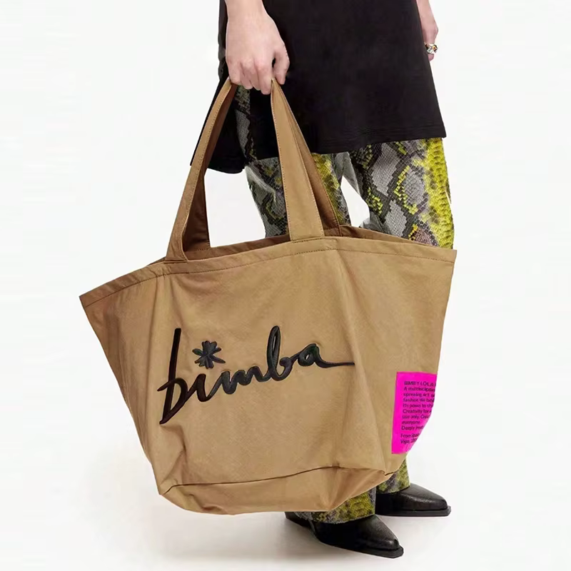 Sac à main populaire de couleur unie, à la mode et simple, grande capacité, lettre décontractée pers
