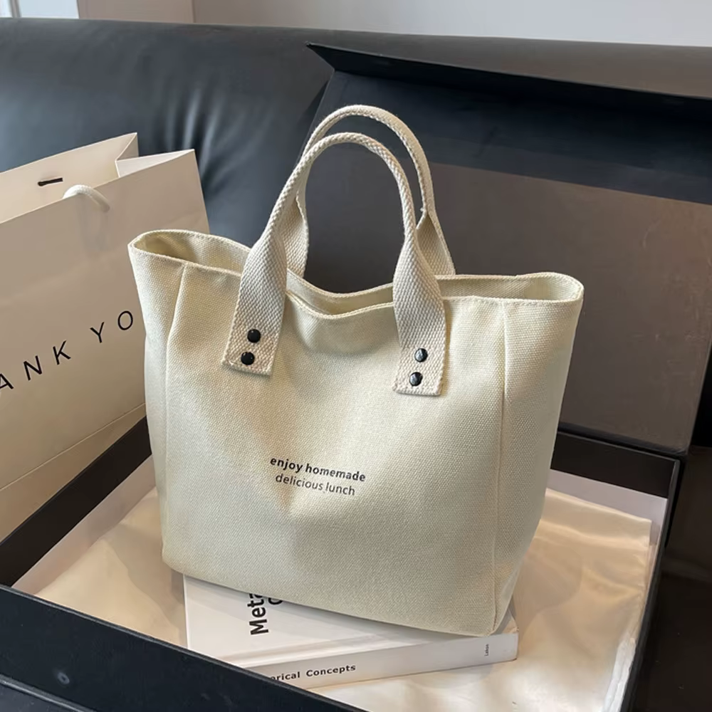 Sac fourre-tout décontracté en toile avec pendentif cloche et fermeture éclair ; ce sac fourre-tout 