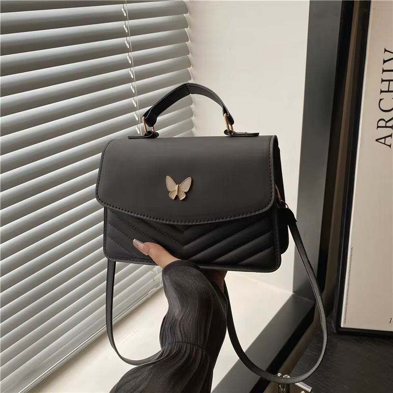 Sac papillon porte-bonheur pour femmes, nouvelle mode, couleur unie, texture simple, tendance, magni