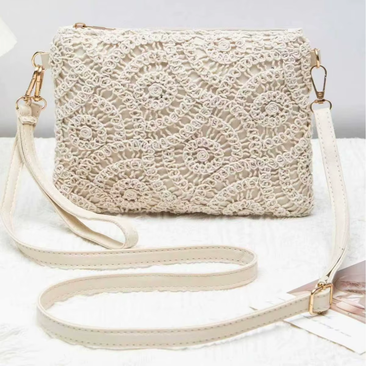 2025 Style bohème polyvalent évider bandoulière tissé sac décontracté plage florale femmes sac à ban