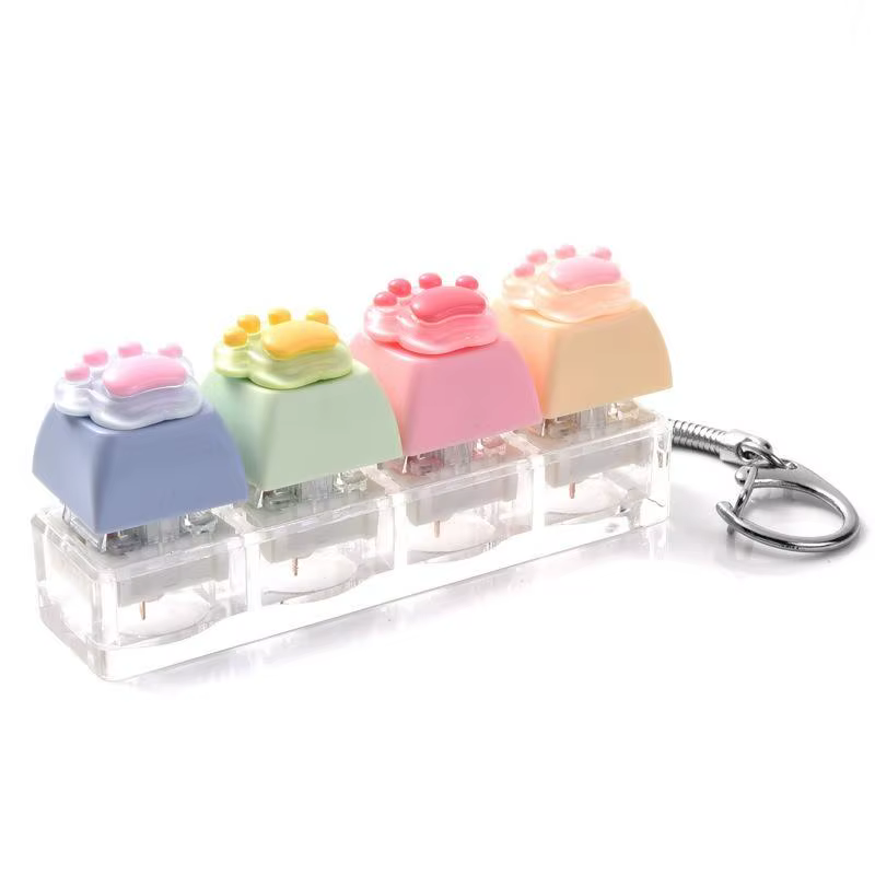 Porte-clés anti-stress mignon en forme de patte de chat, mini jouet sensoriel souple avec bouton à p