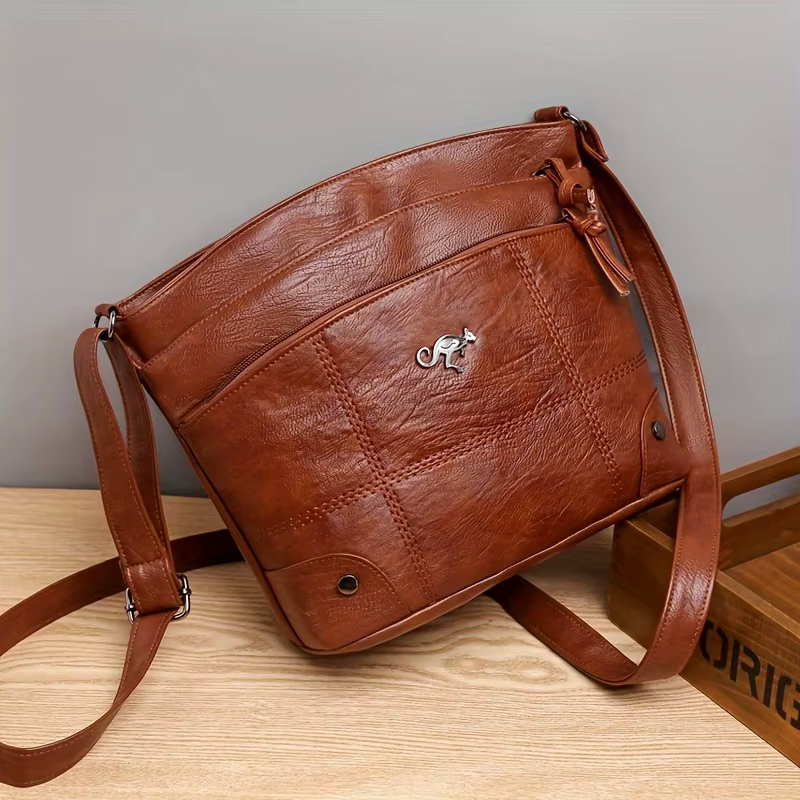 Sac bandoulière en cuir de style vintage avec compartiments multi-couches, large sangle réglable et