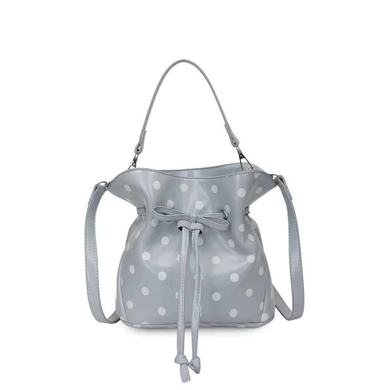 Sac seau mini en similicuir souple à pois avec cordon de serrage, nœud et bandoulière amovible, poig