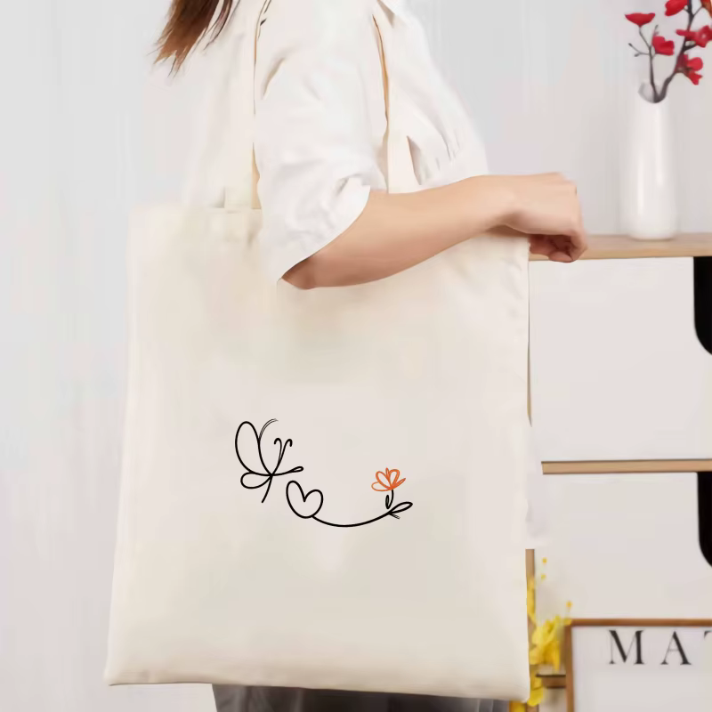 Sac à main en toile crème avec motif papillon, cœur et fleur, pour un usage quotidien, le shopping e