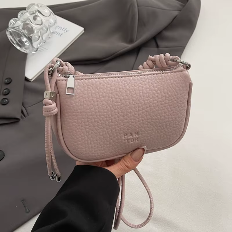 Le sac à bandoulière pour femme est à la mode, polyvalent, couleur unie, design exquis, les déplacem