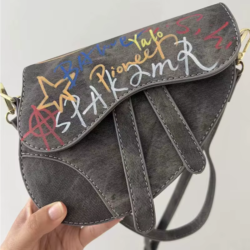 Sac à bandoulière 2025 automne hiver nouveau Denim Graffiti Y2k sac de selle unisexe fourre-tout mod