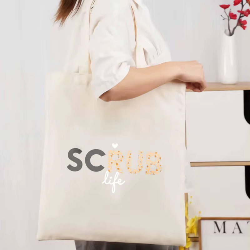 Sac fourre-tout en toile, texte de vie mat crème et motif de points, adapté à un usage quotidien et 