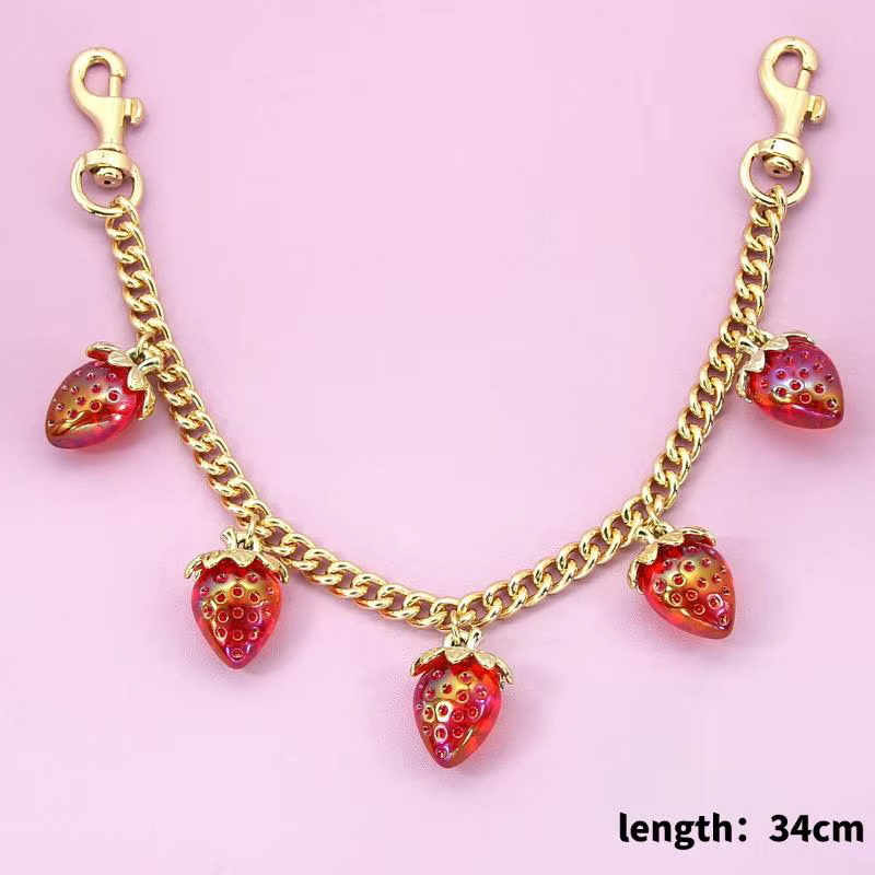 Chaîne DIY pour sac à main avec pendentif fraise-cerise, offrant un design détachable et élégant
