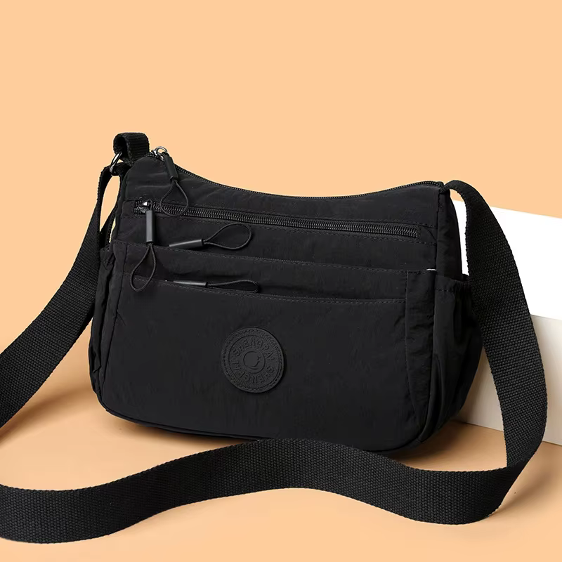 Sac à bandoulière décontracté multicouche pour femmes, multi-poches de couleur unie, polyvalent pour