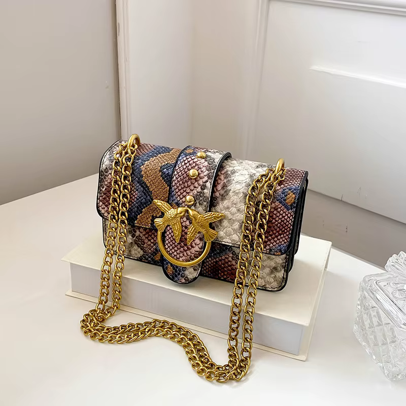 Sac à bandoulière tendance pour femme avec chaîne et blocs de couleur, sac à main élégant à porter s
