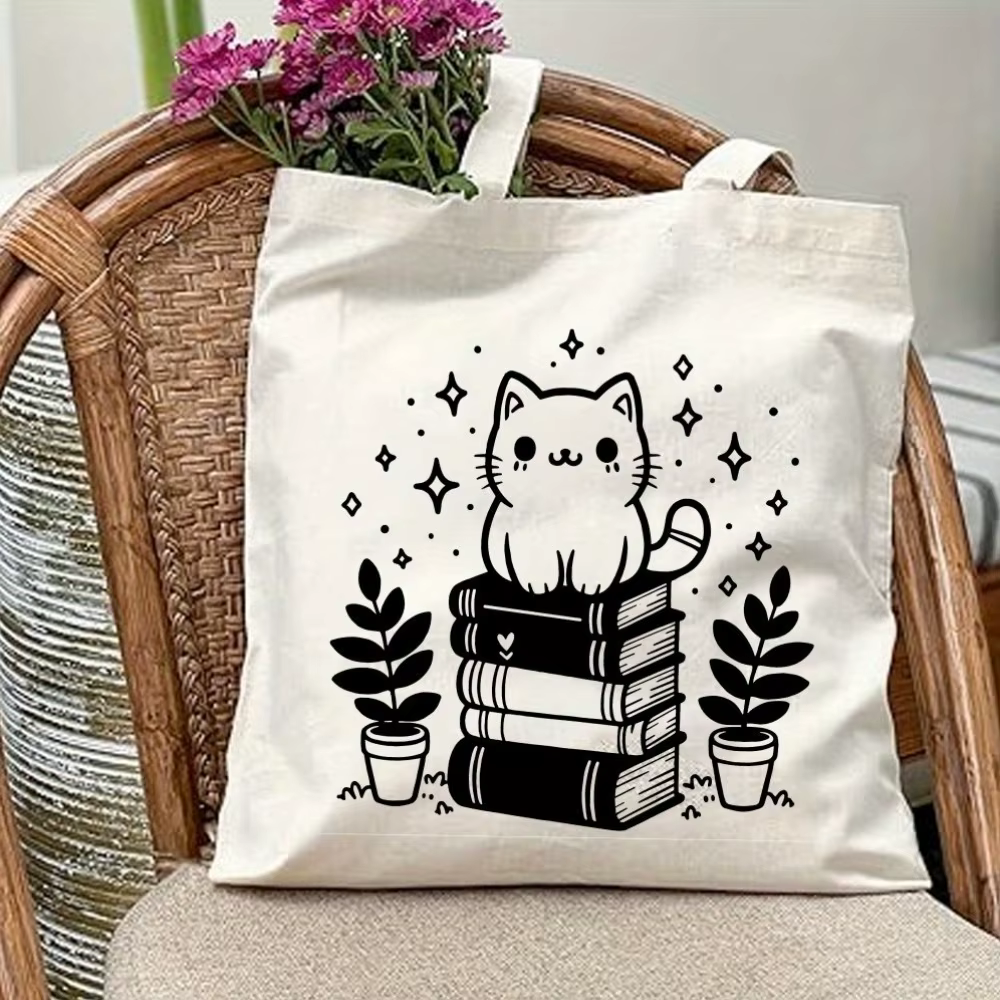 Sac fourre-tout en toile imprimé avec motif de chat sur un livre, adapté à un usage quotidien, aux c