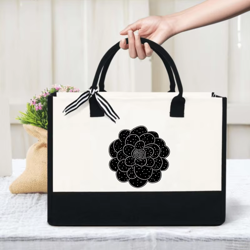 Sac fourre-tout en toile à motif floral crème et noir avec motif spirale pour le shopping et l'usage