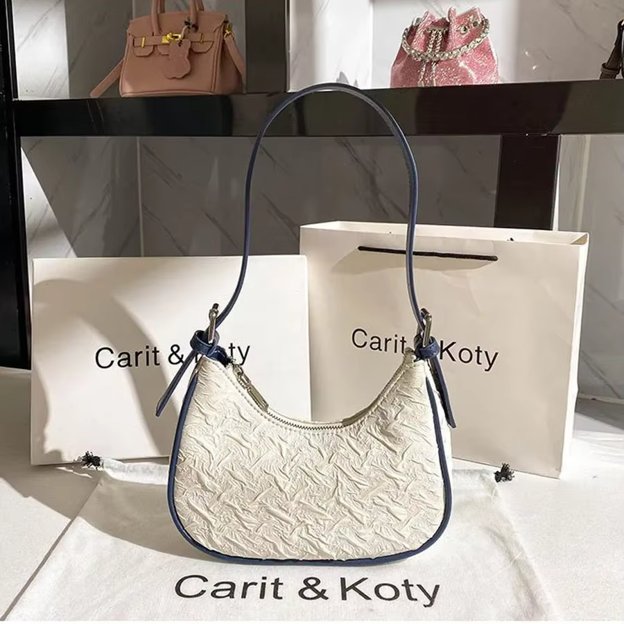 Sac plissé tendance de l'année au design original et raffiné, sac croissant pour femme, design de ni