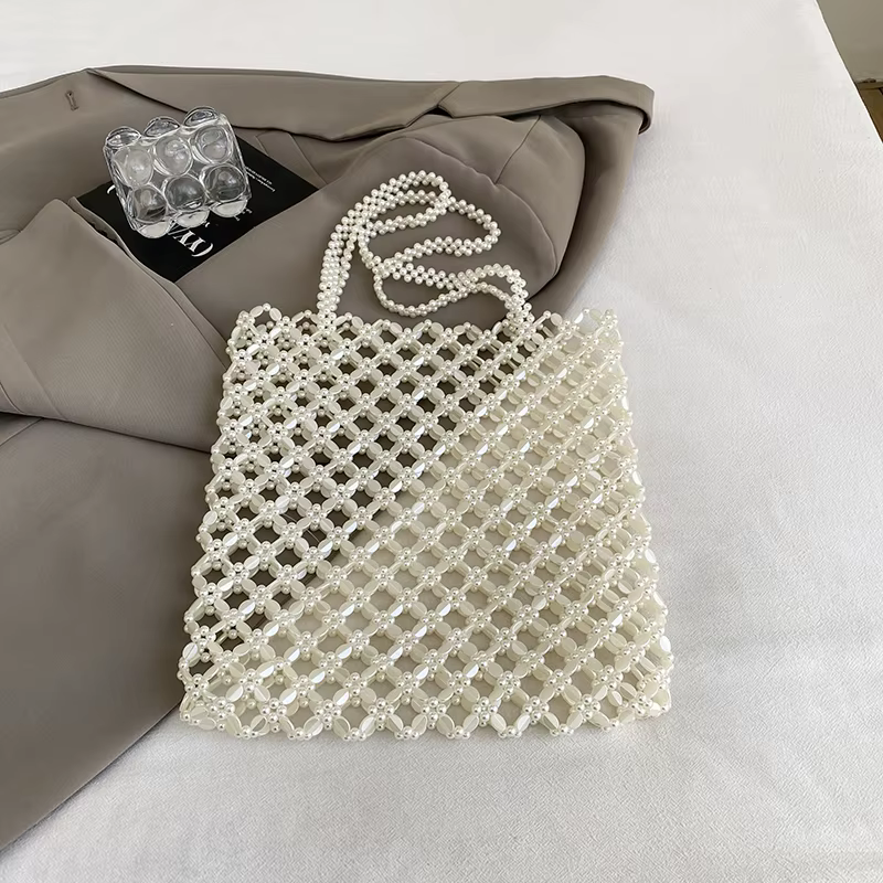 2025 nouveau sac de vacances d'été Boho plage évider sac à bandoulière pour les femmes à la main per