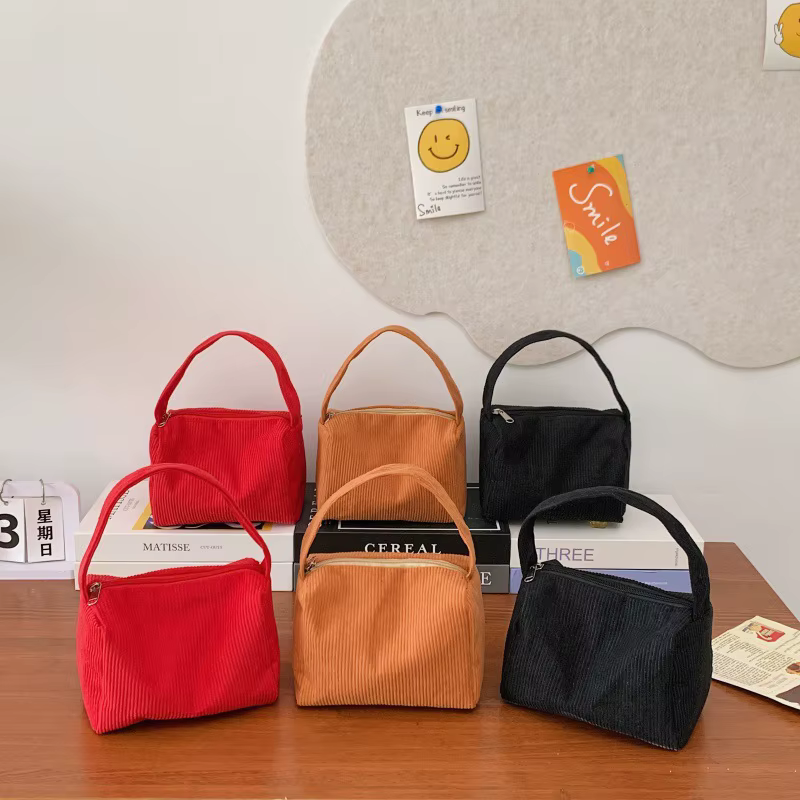 Sac carré compact à porter à la main