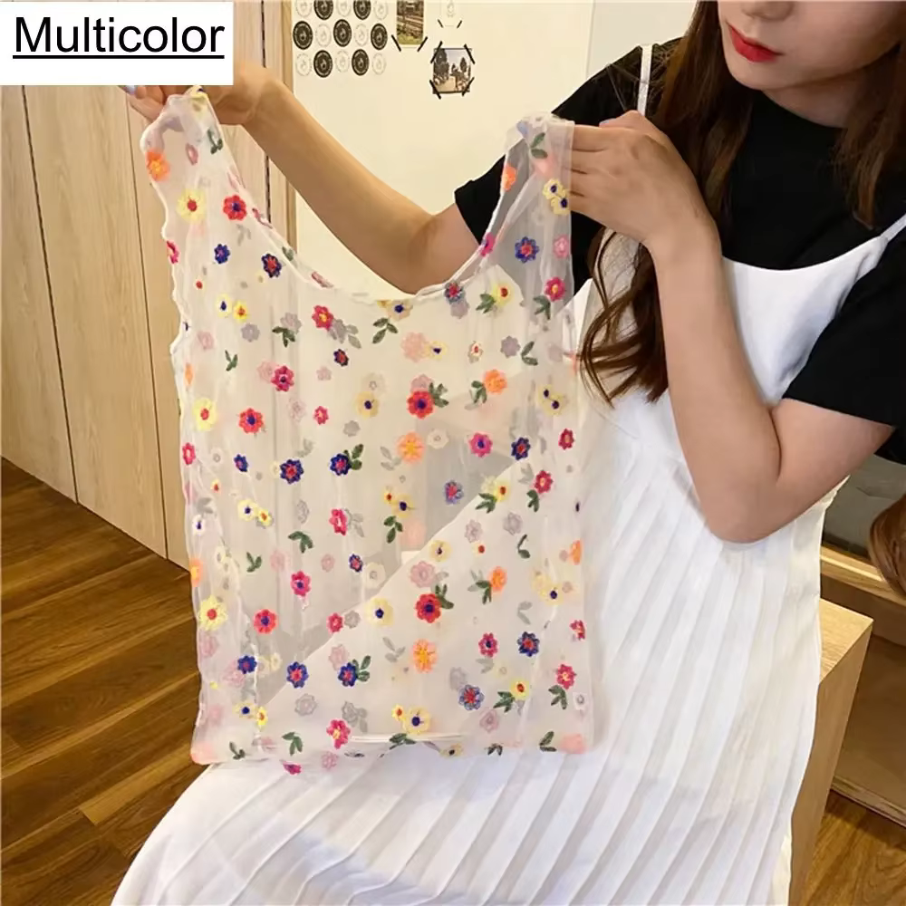 Sac à main brodé en maille transparente