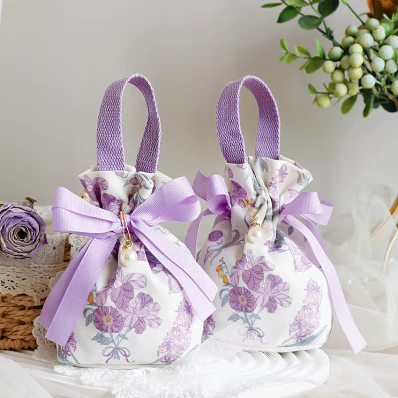 Mini sac à cordon en toile à motif floral avec nœud papillon et chaîne de perles