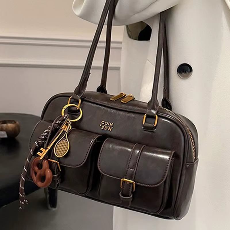 Sac à bandoulière rétro en cuir de couleur unie pour femmes