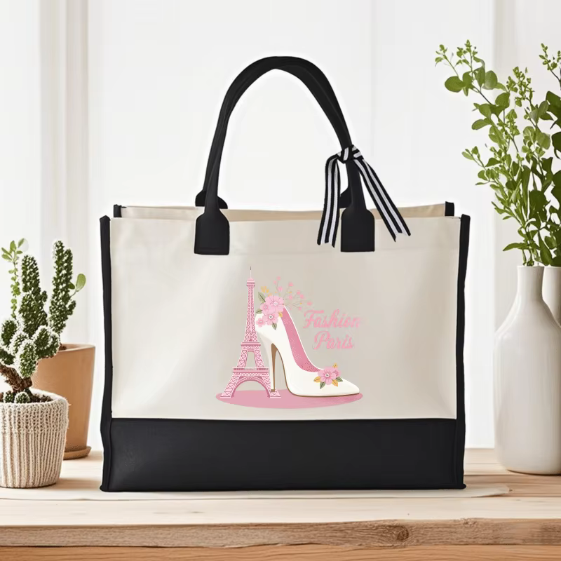 Sac à main élégant en talons tour Eiffel crème et noir au design floral avec un texte parisien
