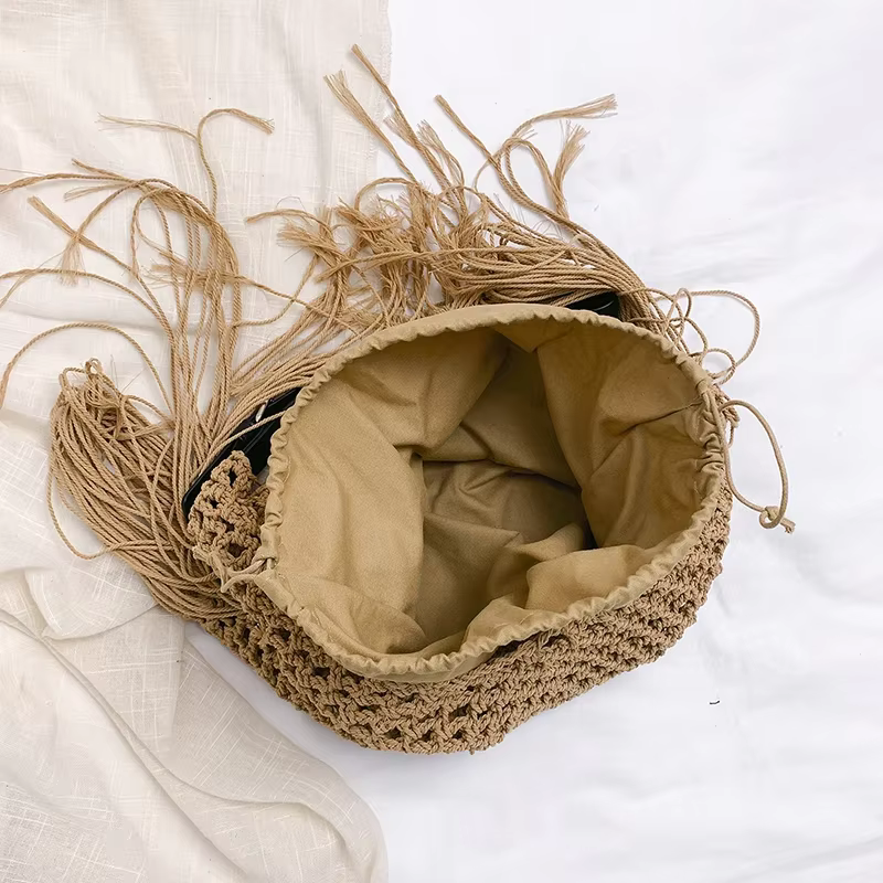 2025 nouveau sac de plage en paille de créateur pour les femmes mode gland sac à main fourre-tout sac de vacances décontracté dame Crochet évider sac à bandoulière