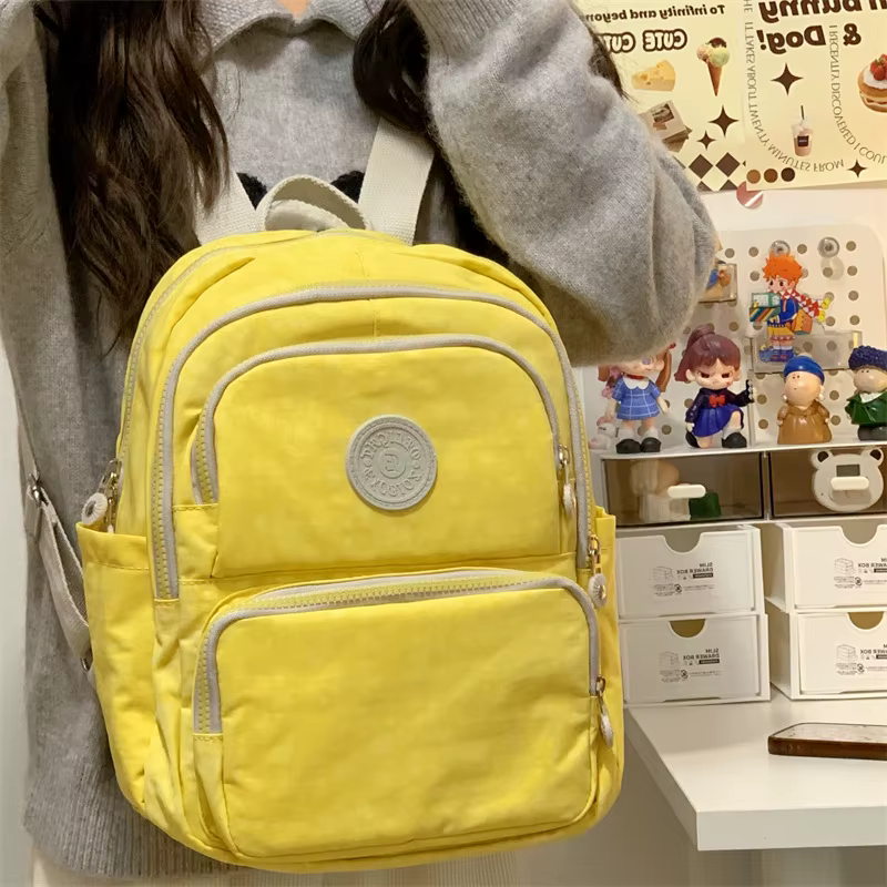 Sac à dos minimaliste jaune vif pour femme