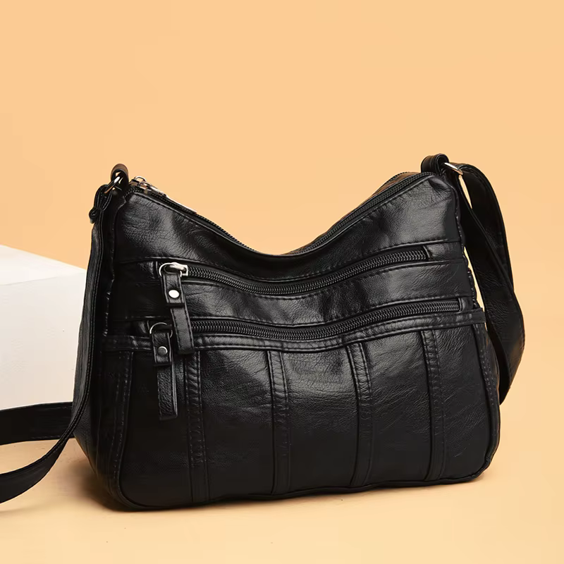 Sac bandoulière noir, sac de voyage avec bretelles réglables et compartiment zippé