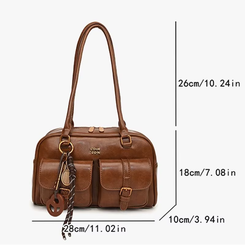 Sac à bandoulière rétro en cuir de couleur unie pour femmes