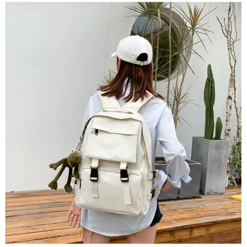 Nouveau sens de haut de gamme du cartable femme lycée campus grande capacité sac à dos travail vent sac à bandoulière mâle ins sac