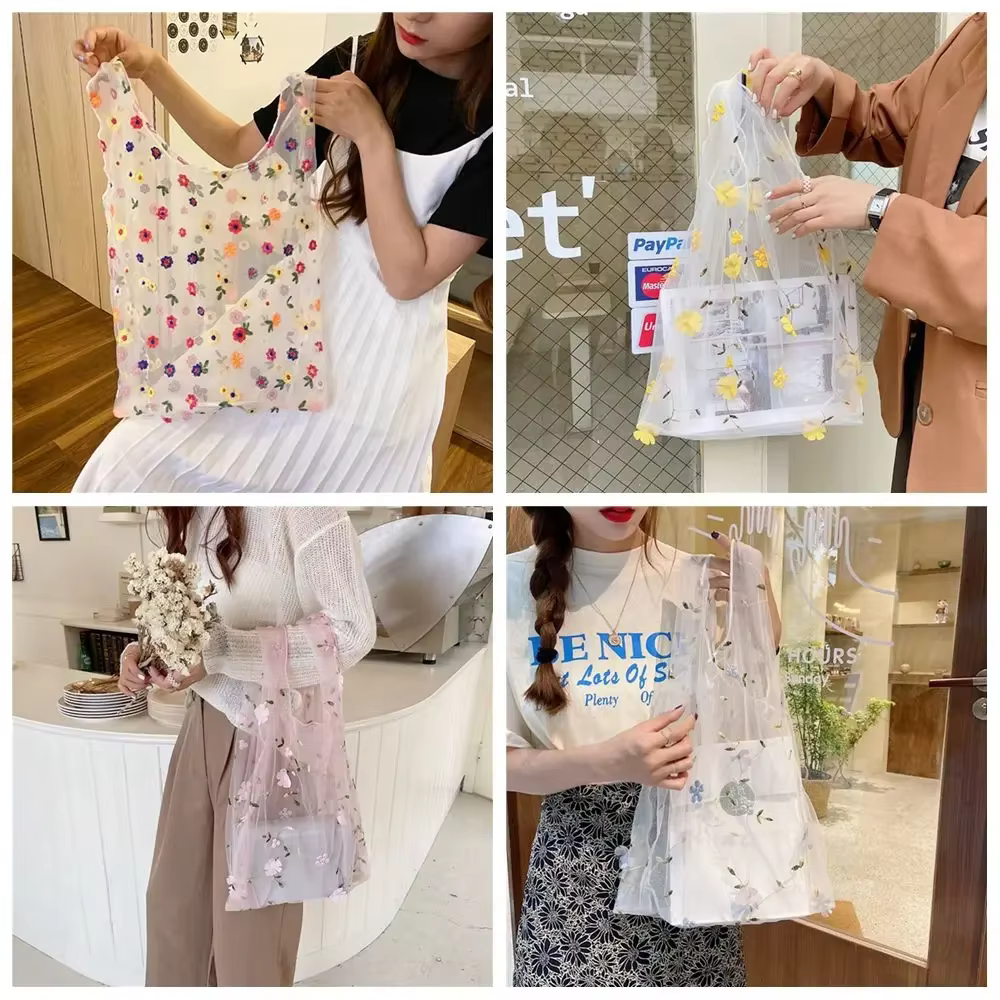Sac à main brodé en maille transparente