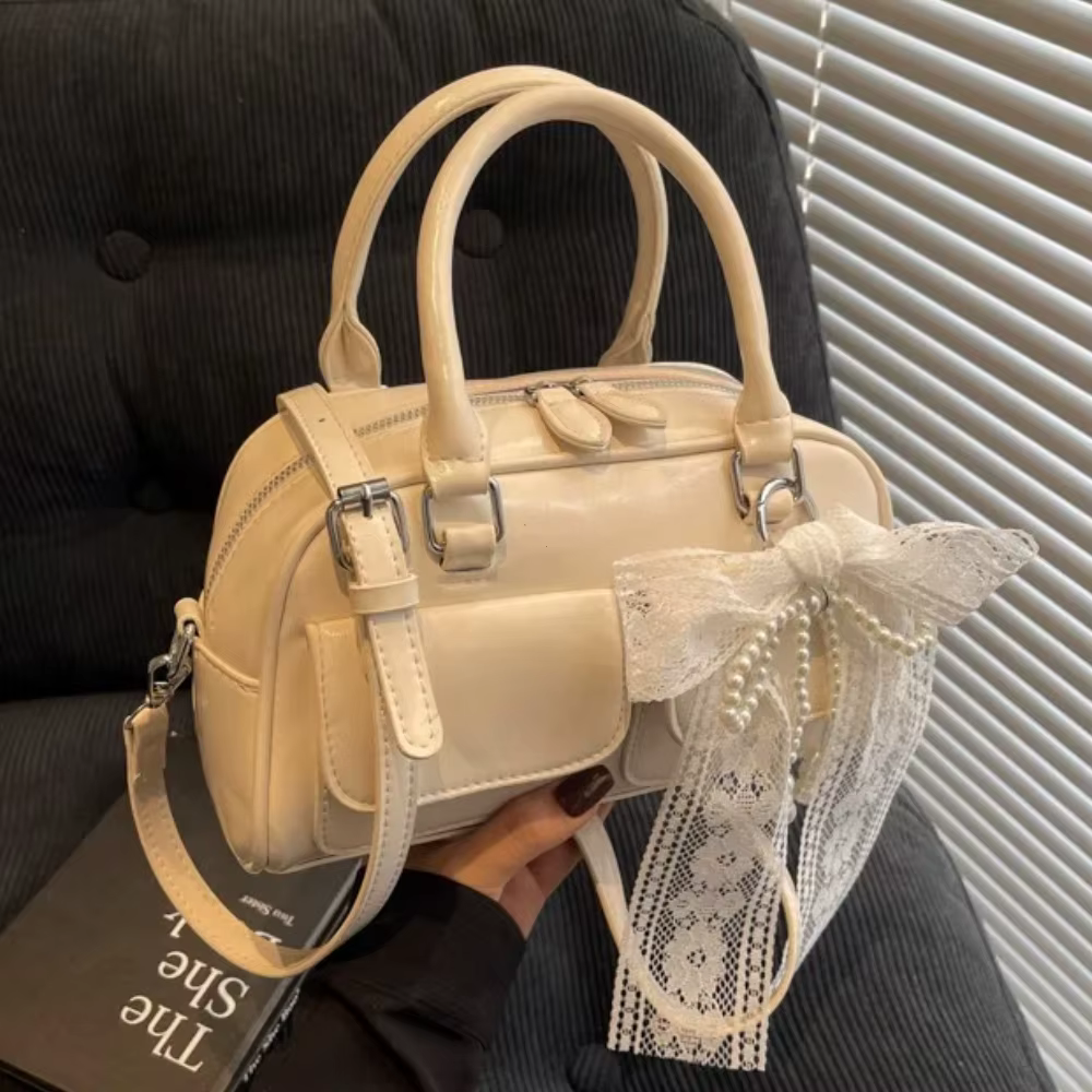 Dames sac à bandoulière mode tout populaire décontracté doux dentelle Ballet Style Design sens du printemps et de l'été nouvelle épaule Ba