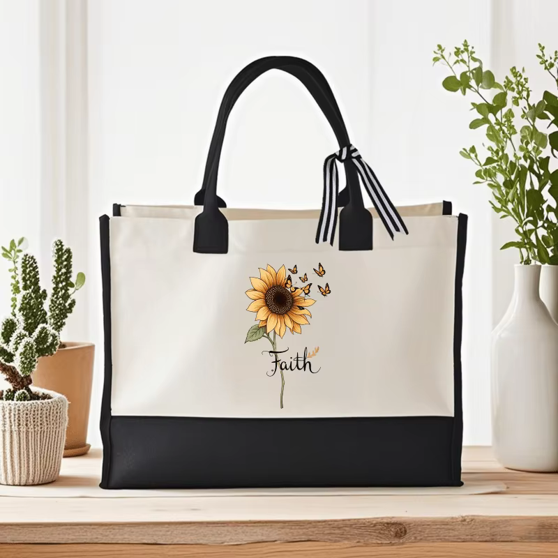 Sac à main en toile de tournesols crème et noirs au design papillon et foi pour un usage quotidien