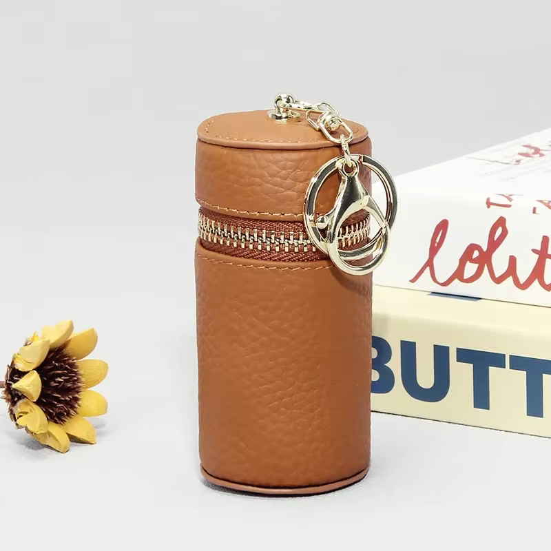 Mini sac de rouge à lèvres en cuir véritable avec porte-clés