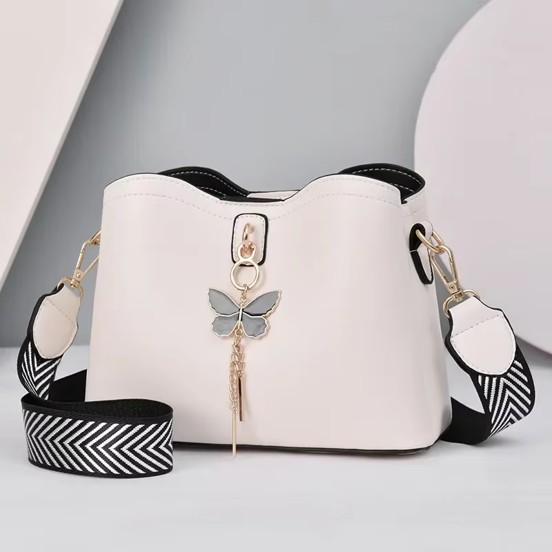 2025 femmes blanc sac à main nouveau concepteur papillon gland PU cuir sacs de messager dames bandoulière femme