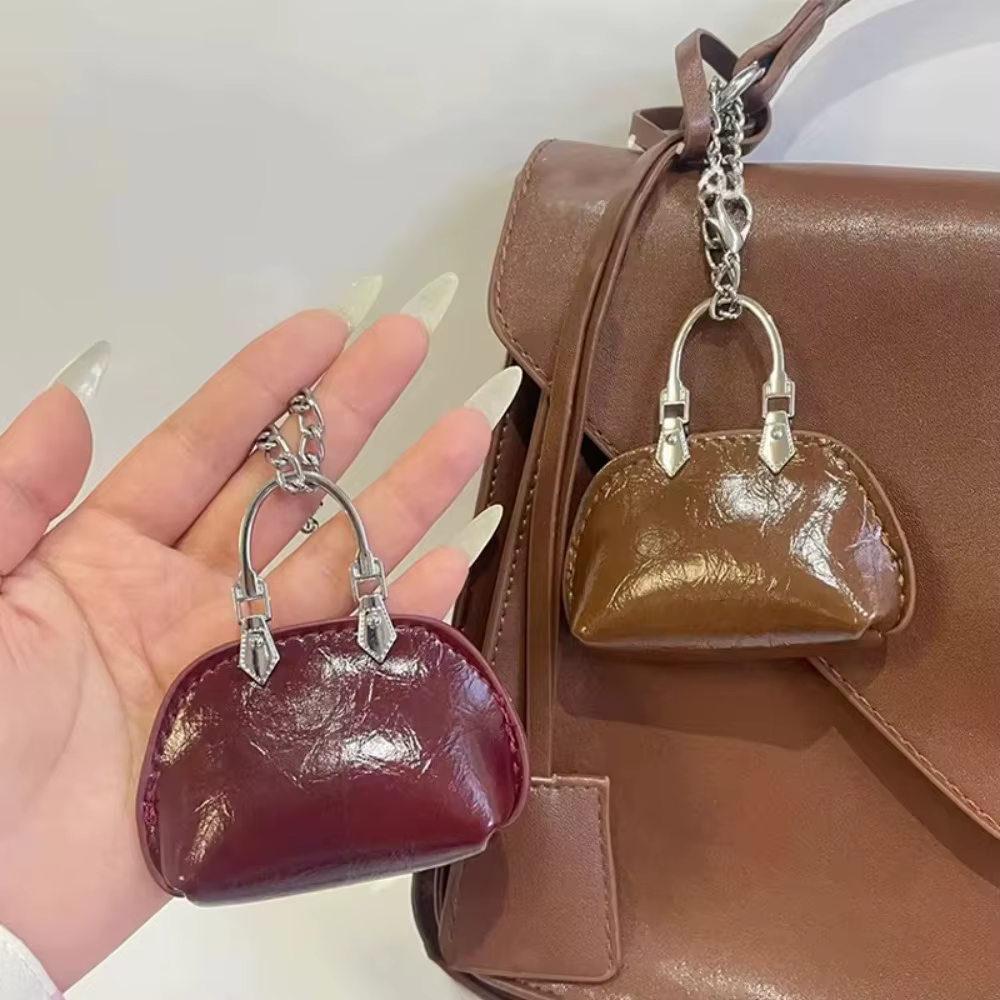 Nouveau Sac décoration sac pendentif petit cuir PU Mini sac à main couleur unie sac suspendu