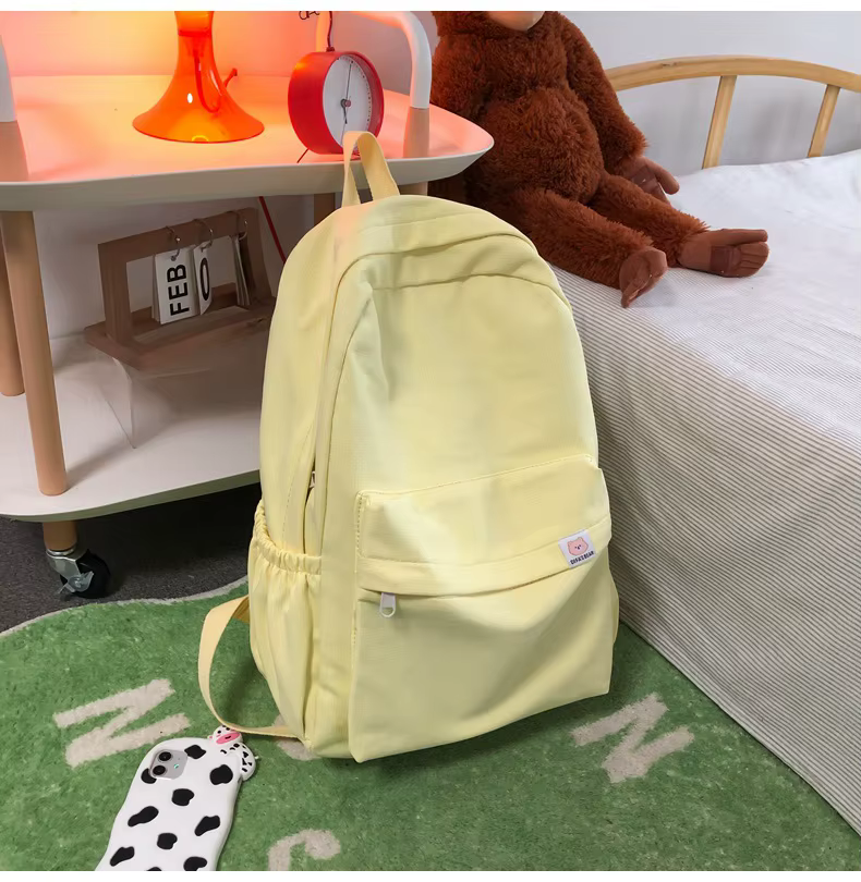 Doux doux fille couleur unie grande capacité étudiant sac à dos nouveau style pour hommes et femmes étudiants simple à la mode