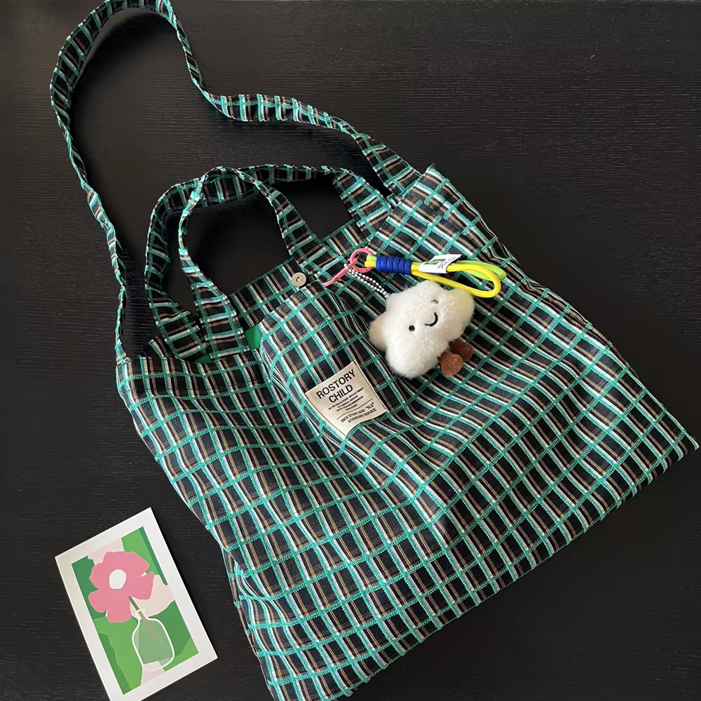 Sac en toile jacquard vert à carreaux color block