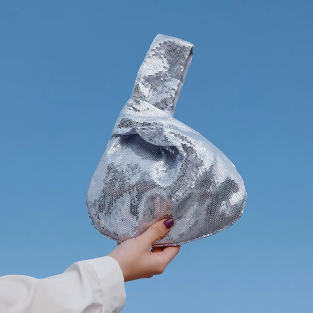Sac de poignet à nœud pailleté