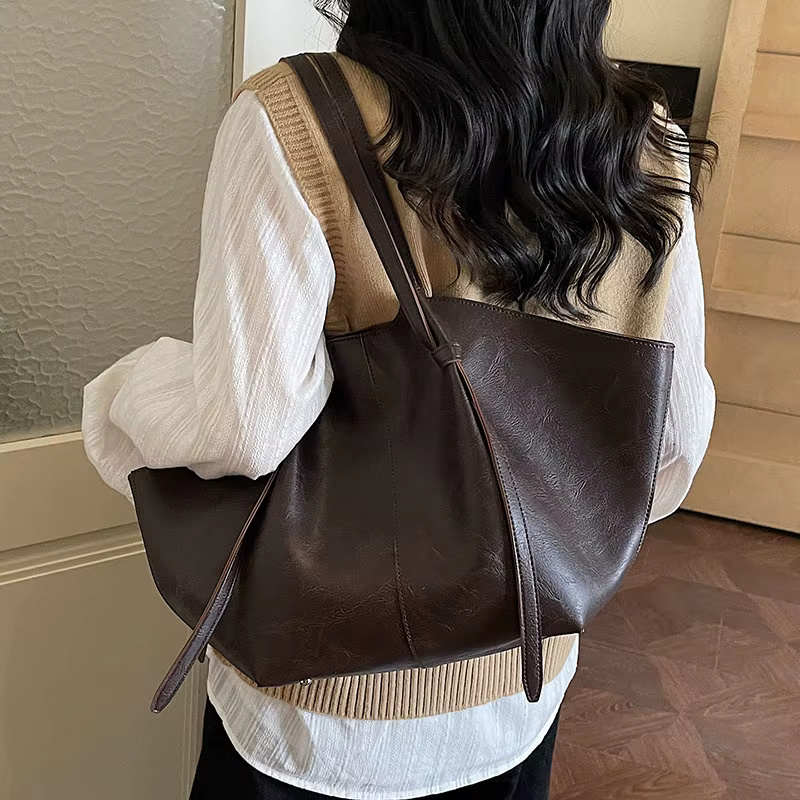 Sac fourre-tout rétro grande capacité, nouveau style 2026, sac de banlieue à bandoulière unique, sac de shopping populaire transfrontalier