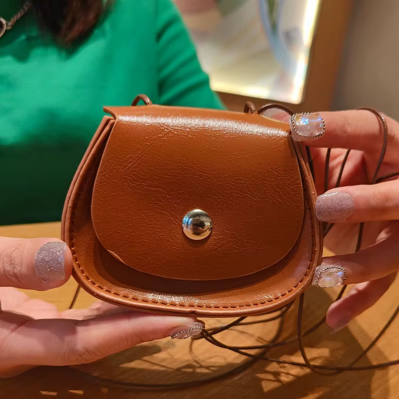 Mini sac à bandoulière en cuir pour femme