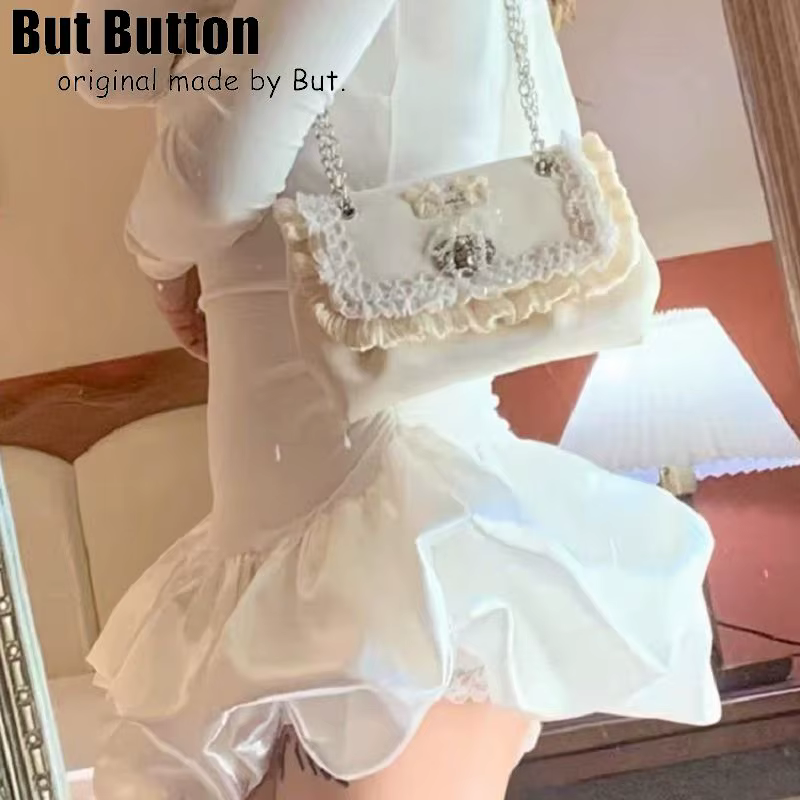 Lolita – sac à main élégant avec nœud en dentelle satinée