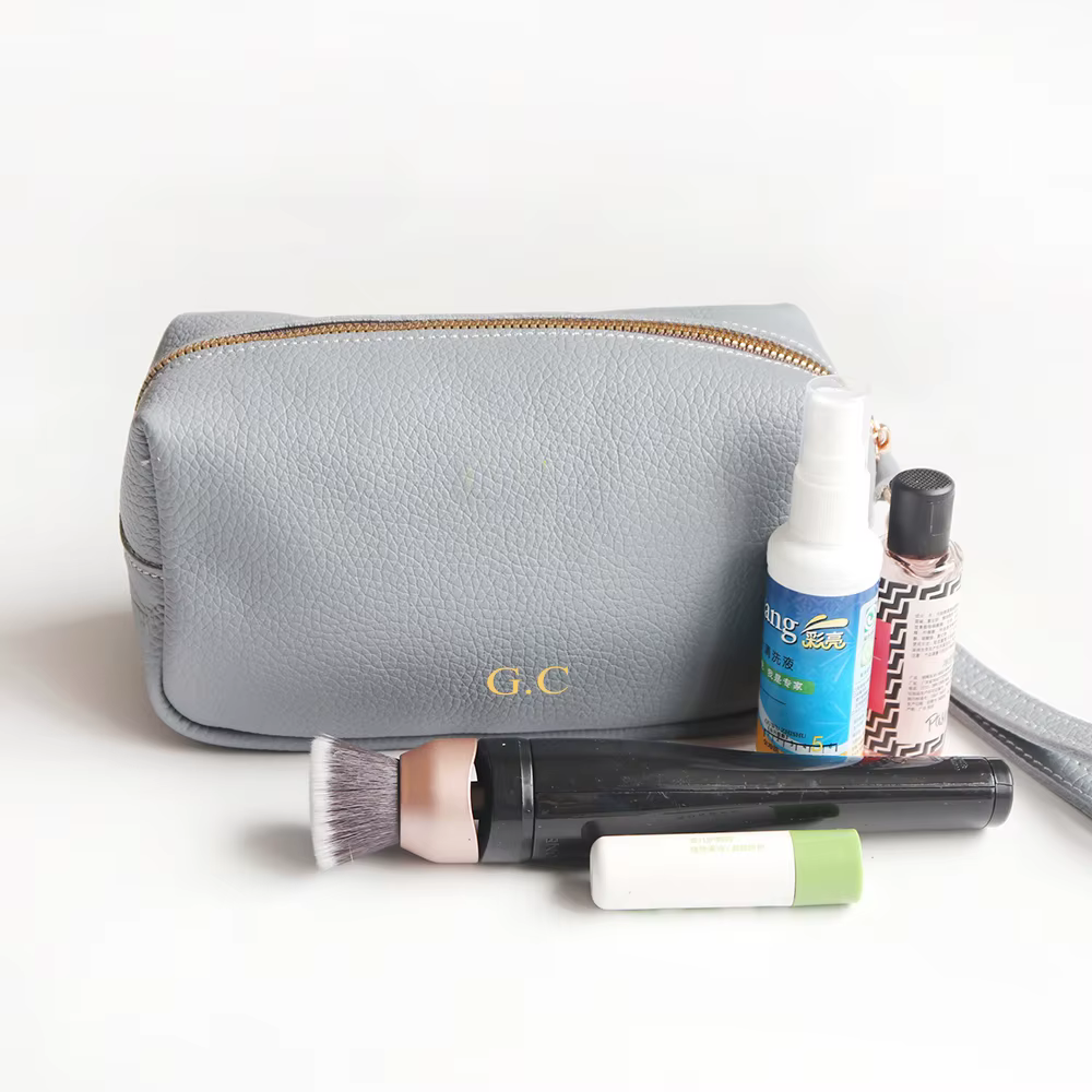 Pochette de maquillage de luxe en cuir véritable pour femmes