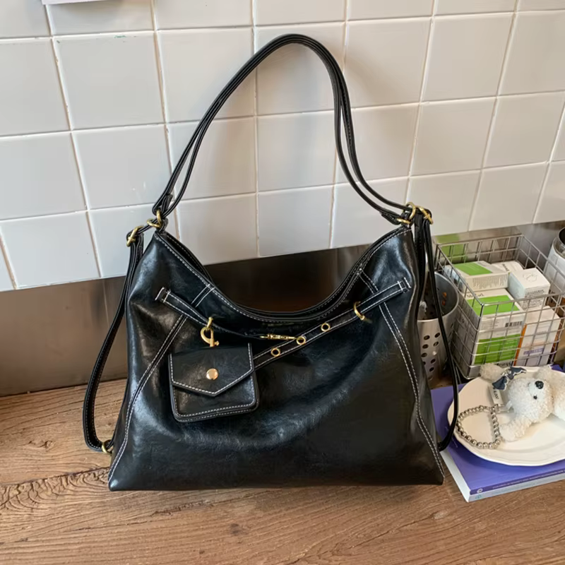 Sac à bandoulière noir avec porte-monnaie
