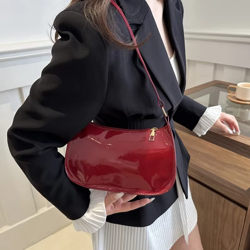Sac à main en cuir verni vintage pour femme