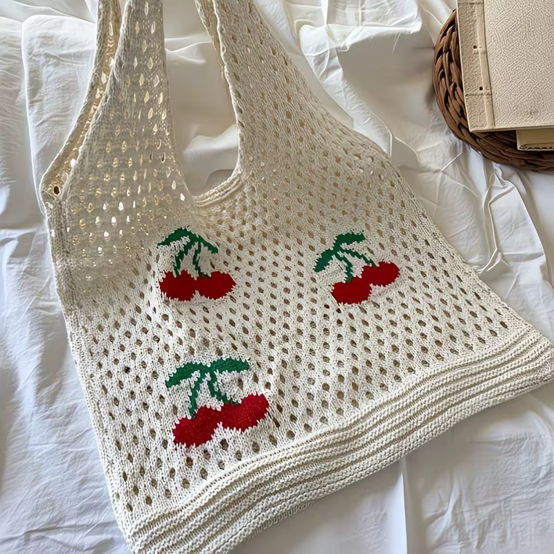 Sac à main en tricot ajouré motif cerise