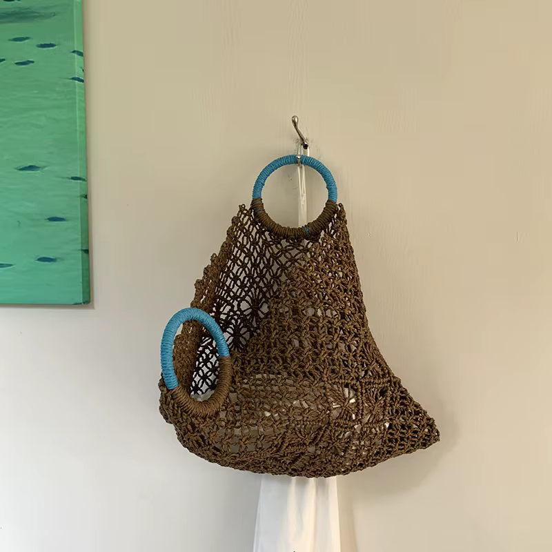Sac de voyage en raphia et rotin