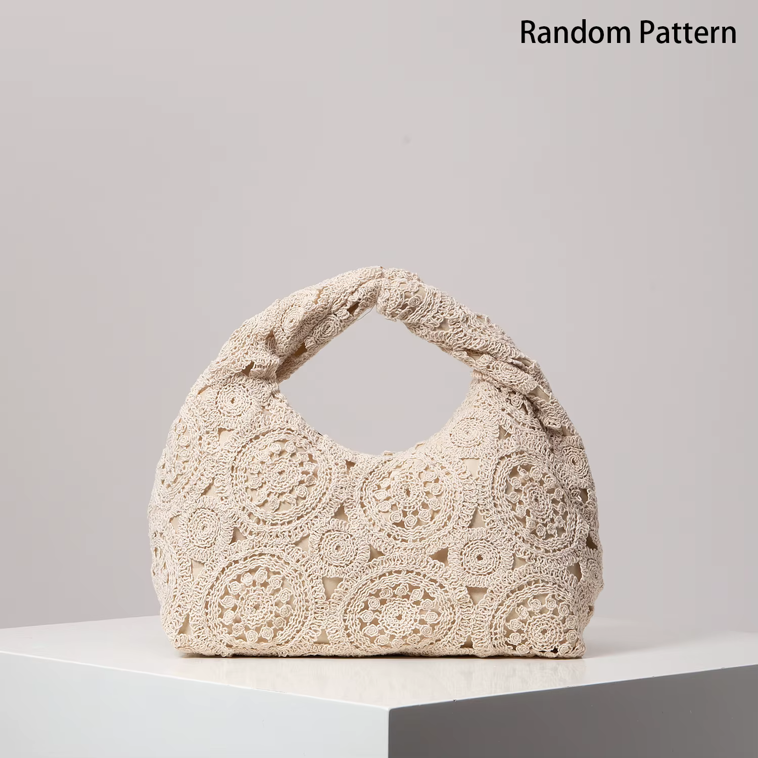 Sac à main tissé à motifs