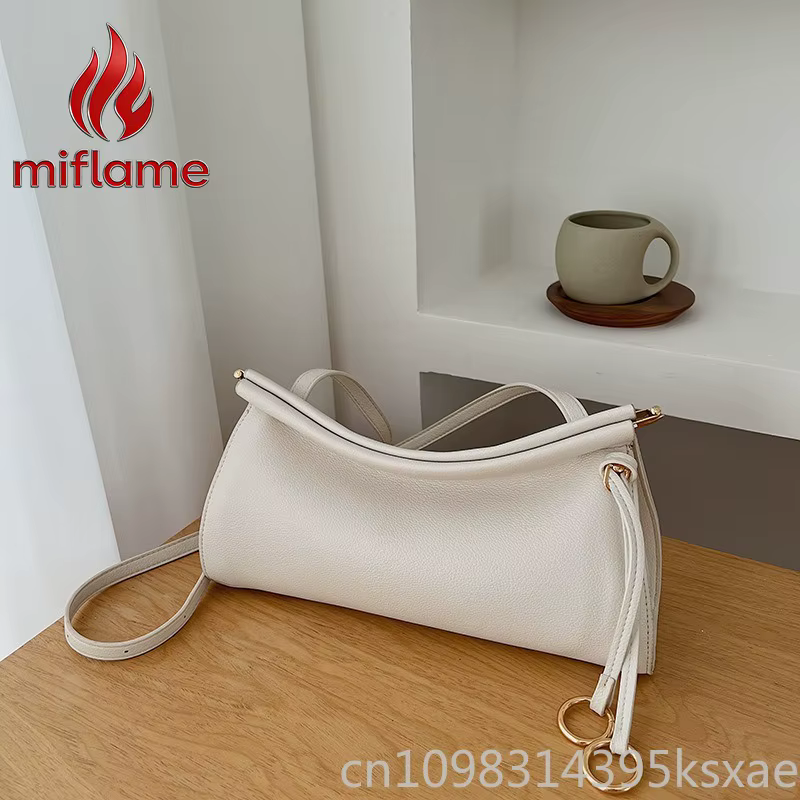 Sac à bandoulière en cuir vintage avec silhouette structurée