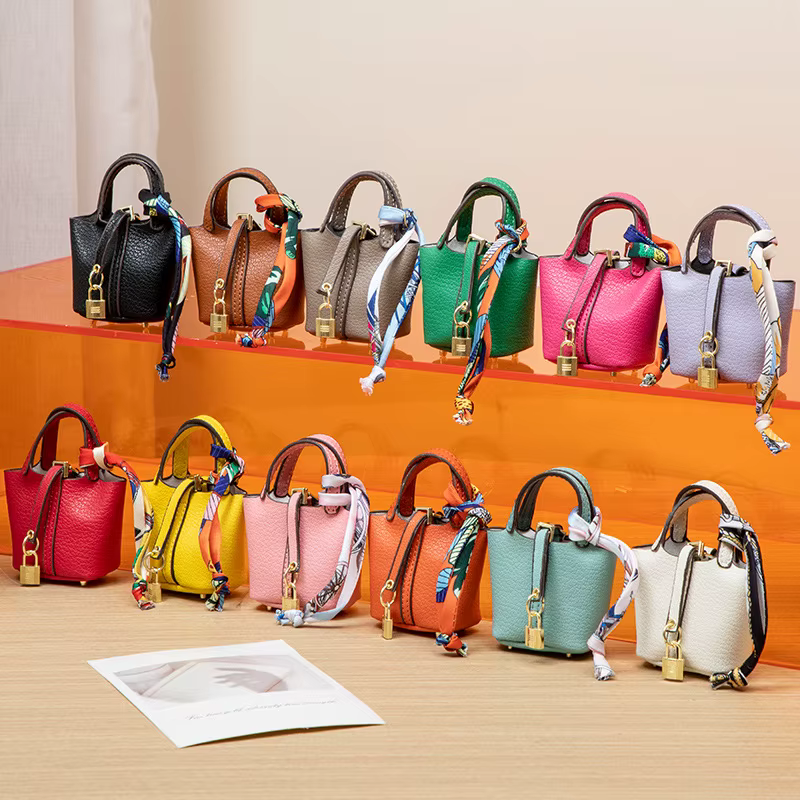 Nouveau Mini maison petit sac en cuir Portable main corde Bluetooth écouteur sac zéro portefeuille multi fonctionnel