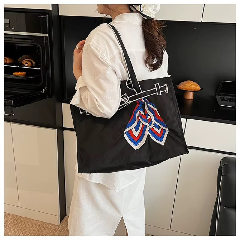Sac à bandoulière brodé créatif 2026 pour femme
